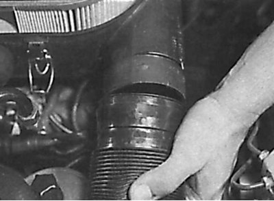Removal the air intake pipe from the air filter housing