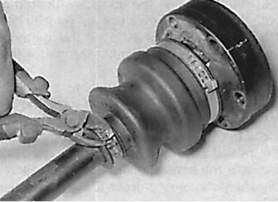 Removal the clamps securing the CV joint protective cover