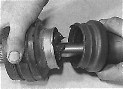 Installing a new protective cover on the CV joint