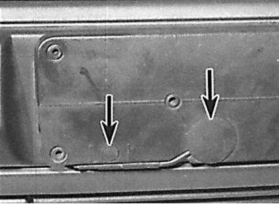 Location of plugs on front license plate support
