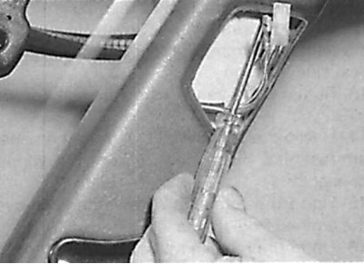 Releasing the rear pillar trim panel retaining bracket