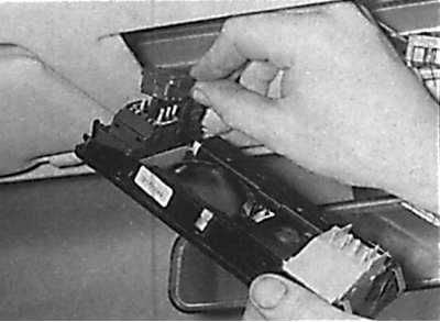 Removal the interior light assembly from the ceiling on later models