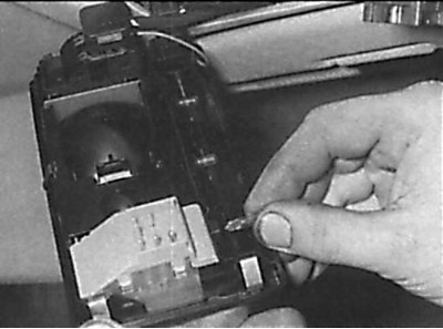 To remove the seat belt warning light, simply pull the light towards you