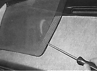 Removal the decorative trim located on the side of the speaker grille