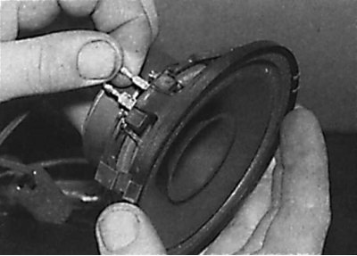 Disconnecting the electrical connectors from the speaker