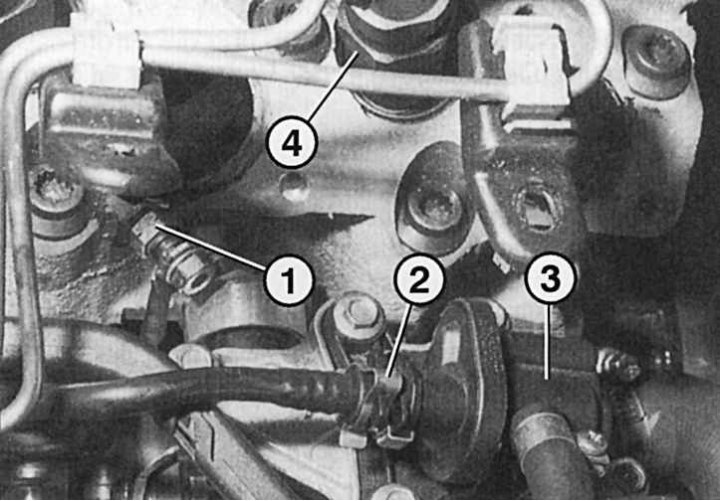 Fig. 4.96. Glow plug location: 1 – glow plug with plug; 2 – fuel line valve on the heat exchanger;…