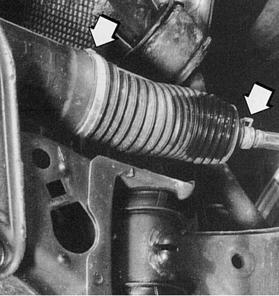 Fig. 7.18. To remove the mudguard clamps, use pliers to cut off the tabs (arrows). Use new clamps…