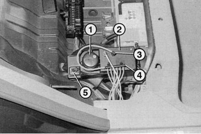 Fig. 10.10. Under the rear seat to the right of the battery, under a separate cover, is the control…