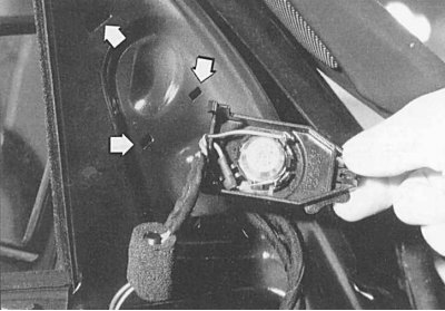 Fig. 10.15. When reinstalling, the high-frequency speaker must be inserted into the holes shown by…
