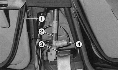 Fig. 10.31. The front seat belt tensioner mechanism is located behind the B-pillar trim: 1 – edging…
