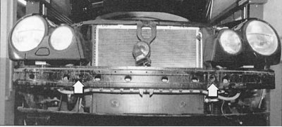 Fig. 11.17. When assembling, the bumper should be installed horizontally on the crossbar (arrows)…