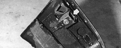 Fig. 11.18. The sliding clamps (arrow) allow you to adjust the gap (5 mm) between the bumper and…