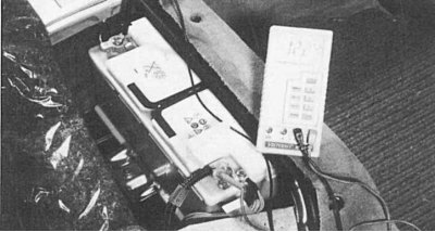 Fig. 9.6. Measuring the battery voltage with a multimeter. If the voltage is below 12.5 V, the…