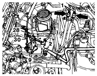 11. Disconnect the vacuum tubes from the intake manifold.
