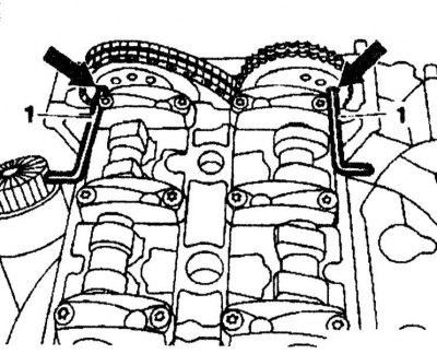 4. Turn the crankshaft with a wrench until the 4 mm holes on the camshaft flanges are aligned. Lift…