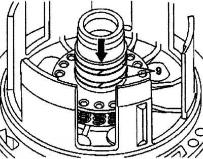 1. Remove the Teflon rings (9) from the grooves in the front cover.