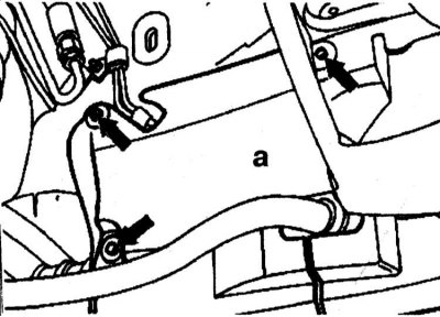 2. Loosen the bolts (arrow) and remove the cover (a) on the right wheel arch.