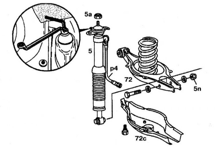 2. Unscrew the upper shock absorber mounting nut.