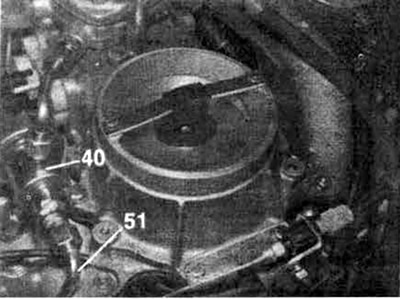 Unscrew the fuel return line (51) from the diaphragm pressure regulator (40). Screw a section of…